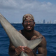 Illustration for article titled Von Miller Says The Bloody Shark Hes Holding Didnt Die